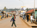 Man Crossing Road and People on Footpath, Kigali, Rwanda
