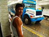 Buy Man Waits for Bus in Torrential Tropical Downpour in Zona Centromexico at AllPosters.com