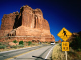 Road Sign in Front of Courthouse Towers, Arches National Park, Utah