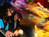 Buy Women on Amusement Ride, Stuttgart, Baden-Wurttemberg, Germany at AllPosters.com