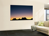 Buy Sunset Silhouetting the Desert Landscape at AllPosters.com