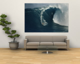 A Surfer Rides a Powerful Wave off the North Shore of Maui Island