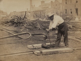 Railroad Construction Worker Straightening Track, c.1862