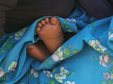 Buy Child's Feet Wrapped with Sari at Kunbuli Friday Market, Orissa, India at AllPosters.com