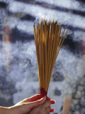 Buy Hand Holding Incense, Hong Kong, China, Asia at AllPosters.com