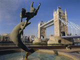 Dolphin Sculpture and Tower Bridge, London, England, UK