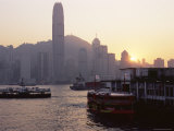 Star Ferry, Victoria Harbour and Skyline of Hong Kong Island at Sunset, Hong Kong, China, Asia