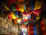 Brightly Dyed Wool Hanging from Roof of a Shop, Marrakech, Morrocco, North Africa, Africa