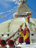 Buy Buddhist Monks with Horns in Front of Stupa, Nepal at AllPosters.com