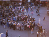 Buy Story Telling, Story Teller and Audience, Place Djemma El Fna, Marrakech (Marrakesh), Morocco at AllPosters.com