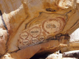 Group of Wandjana 'Faces' on Shaded Underside of Rock, Western Australia, Australia