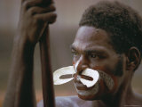 Buy Portrait of a Tribesman with Large Nose Ornament, Irian Jaya, New Guinea, Indonesia at AllPosters.com
