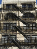 Fire Escapes on the Outside of Buildings in Spring Street, Soho, Manhattan, New York, USA