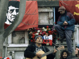 Buy Guitarist Plays Victor Jara Songs at His Grave on 11th De Septiembre, Chile, South America at AllPosters.com