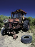 Buy Abandoned Tractor Rusts Away Behind a Coastal Sand Dune, Australia at AllPosters.com