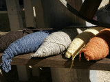 Buy Bundles of Colorful Wool Yarn on Rustic Wool Spinner, California at AllPosters.com