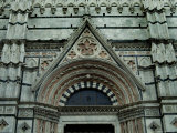 Close View of Top of One of the Portals to the Duomo di Siena, Tuscany, Italy