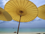 Beach from Underneath Yellow Umbrellas at the Amanpuri Hotel