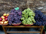Grapes and Nectarines on a Bench at a Siena Market, Tuscany, Italy