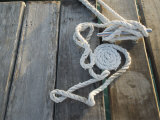 Dock Line Coiled on Pier Tied to Cleat, Ambergris Caye, Belize