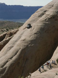 Buy Jeep Drives Down a Slick Rock Formation Called Lion's Back, Utah at AllPosters.com