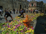 Buy Fire Starts in a Pile of Confetti and Streamers During the Celebration of Saint Paolo, Italy at AllPosters.com