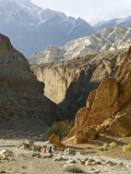 Buy Distant Hikers in a Gorge, Mustang, Nepal, Peaks in Background at AllPosters.com