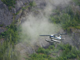 Buy Float Plane against Granite Cliff, Alaska at AllPosters.com
