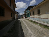Buy Quiet Mexican Cobblestone Street, San Cristobal de Las Casas, Mexico at AllPosters.com