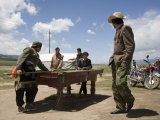 Playing Outdoor Pool at a Nomadic Market near Parked Motorcycles, Qinghai, China