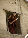 Monk in a Dormitory Window with a Book, Qinghai, China