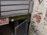 No Trespassing Sign under the Boardwalk at Coney Island, Brooklyn, New York Photographic Print