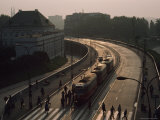 Pedestrians and Trams in Warsaw, Poland