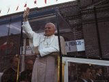 Buy Pope John Paul II Waves from his Bulletproof Vehicle, Warsaw, Poland at AllPosters.com