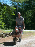 Buy Man Gives his There Grandchildren a Ride in a Wheelbarrow at AllPosters.com