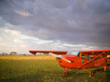 Buy The Cessna Makes a Pit Stop to Refuel on the Serengeti, Tanzania at AllPosters.com