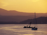 Yacht and Dredge Moored in Safe Harbour with a Golden Sunset, Australia