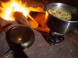 Buy Split Pea Potato Soup Simmers on a Camp Stove Next to Camp Fire, Colorado at AllPosters.com