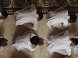 Buy Vietnamese Men Bow Down During Worship at the Cao Dai Great Temple at AllPosters.com