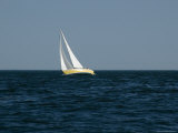 Yellow Hulled Sailboat under Sail