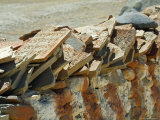Buy Stones Inscribed with Buddhist Prayers on a Wall in Mustang, Nepal at AllPosters.com