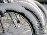 Buy Snow Covered Bicycles Parked in Town at AllPosters.com