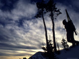 Buy Silhouette of a Skier Standing on Hill with Skis on his Back, Colorado at AllPosters.com