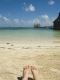 Buy Womens Feet on the Beach with a View of the Ocean, Pier and Boats, Ambergris Caye, Belize at AllPosters.com