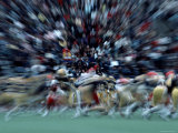Buy Zoomed View of a Football Game and Crowds in the Stands at AllPosters.com