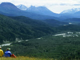 Buy Two Hikers Stop and Relax to Enjoy the Valley View, Alaska at AllPosters.com