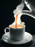 Coffee Being Poured into a Cup