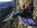 Buy Woman Hanging Out on Her Bivouac Ledge after a Day of Climbing at AllPosters.com