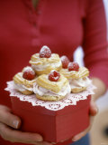 Profiteroles with Raspberry Cream on Gift Box