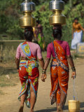 Women from Khilabandar Balance Containers of Water on their Heads